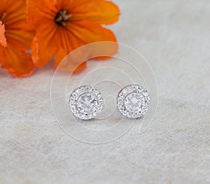 A pair of beautiful 925 sterling silver earrings with cubic zirconia isolated photo