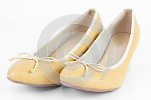 Pair of beige high heels shoes