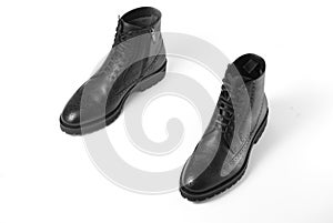 A pair of black leather men`s boots, Full brogue,