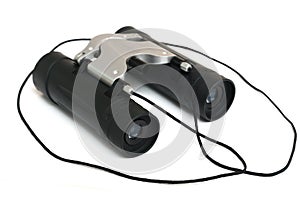 A pair of black and silver binoculars with string strap