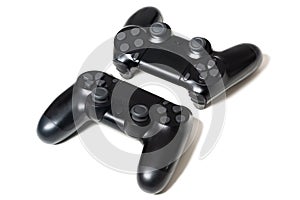 Pair of black video game controllers