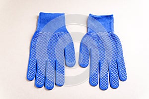 Pair of blue cloth gloves