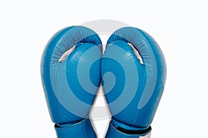 A pair of blue leather boxing gloves close-up top view