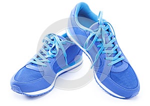 Pair of blue sport shoes on white background