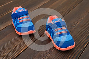 Pair of blue sporty shoes for kid