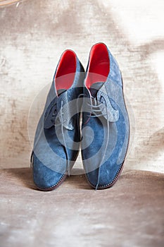 Pair of blue sued shoes for men