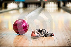 Pair of bowling shoes and ball