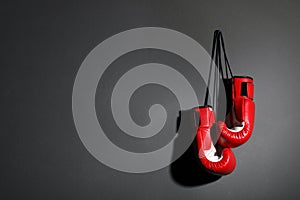 Pair of boxing gloves on grey background