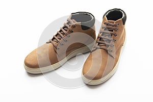 Pair of Brown Boots on White Background