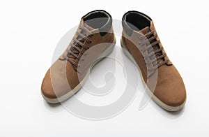 Pair of Brown Boots on White Background