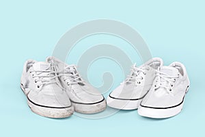 Pair of clean and dirty sneakers on turquoise background