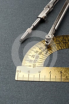 Pair of compasses and protractor