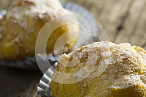Pair of cream puffs filled with cream