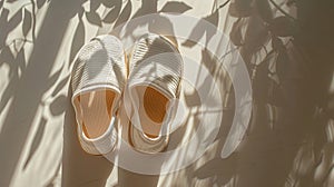 A pair of creative EVA slippers, EVA material, high-grade white background, dappled sunlight