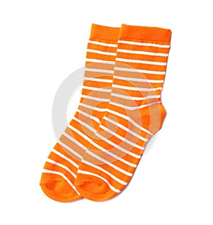 Pair of cute child socks on white background