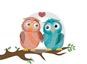 A pair of cute owlet sitting on a branch. Owls in love hearts