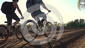 A pair of cyclists go to the forest, slow motion