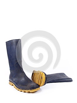 Pair of dark blue dirty rubber boots