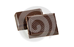 Pair of dark piece broken chocolate bar isolated on white macro