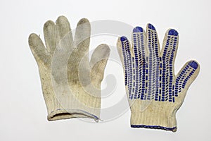 Pair of dirty gloves for gardening. dotted anti-skid surface