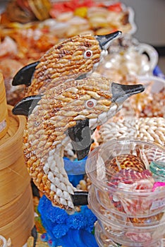 A Pair of Dolphin Souvenirs made from Shells