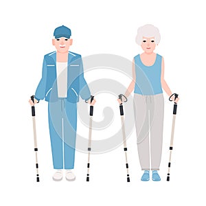 Pair of elderly men and women dressed in sports clothes performing nordic walking. Healthy outdoor activity for old