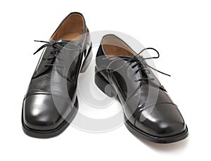 Pair of elegant mens shoes. Fashion black shiny leather. Isolated on a white background