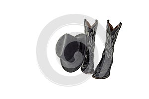 A pair of fancy black cowboy boots with a black felt homburg
