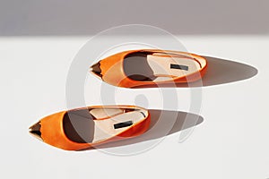 Pair of female summer shoe.orange girls shoes