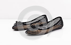 Pair of female summer shoe on white background