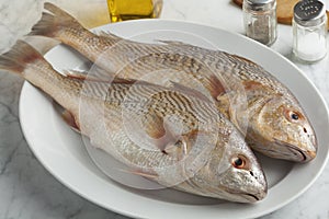 Pair of fresh raw koebi fish