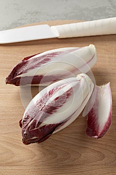 Pair of fresh raw radicchio rosso close up photo