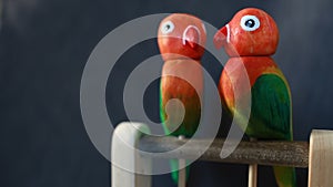 Pair of funny lovebird parrots toy