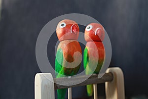 Pair of funny lovebird parrots toy