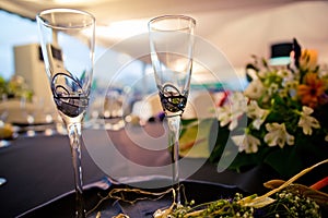 Pair of glasses prepared for the toast with champagne at an event