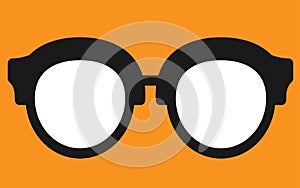 A pair of glasses spectacles bold black silhouette against a orange backdrop