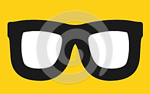 A pair of glasses spectacles bold black silhouette against a yellow backdrop