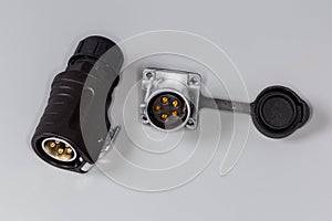 Pair of industrial electrical connectors with plug and panel socket