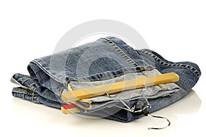 Pair of jeans with a clothes hanger
