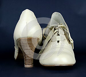 Pair of ladies beige leather high heeled shoes
