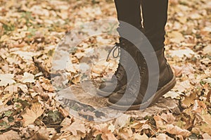 A pair of Leather Boots in the forest