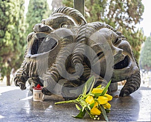 A pair of masks on the tomb of the Genoese actor of comedy Gilberto Govi, founder of the Genoese dialect theater in the monumental