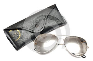 A pair of metallic silver aviators sunglasses with a black holder pouch photo