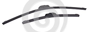 Pair of modern frameless windshield wipers blades on white background