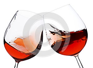 Pair of moving red wine glass