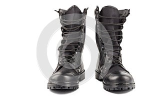 pair of new black lightweight military boots isolated on white background
