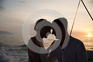 Young couple elope on boat photo