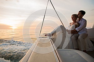 Young couple elope on boat photo