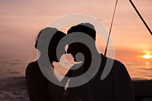 Young couple elope on boat photo