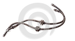 Pair of old brake hoses on white background in photo studio - a high-pressure hose with fluid and metal nozzles for replacement
